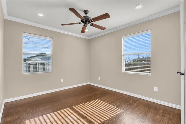a bathroom with a granite countertop sink a large mirror and a shower