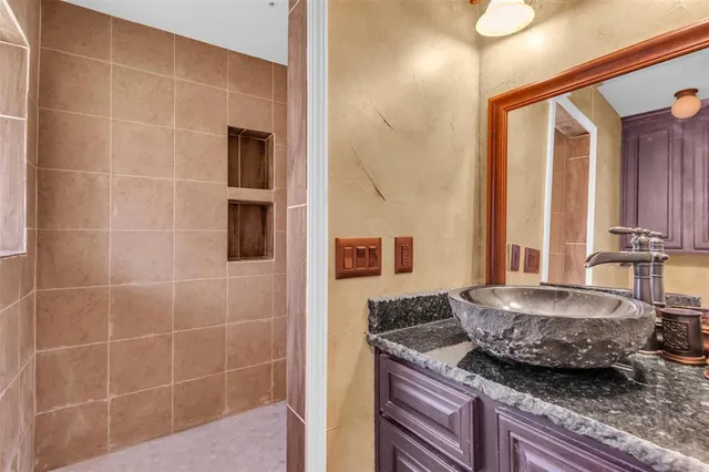 a view of wooden floor and window in an empty room