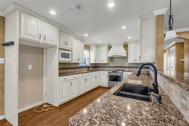 a view of room with furniture and windows