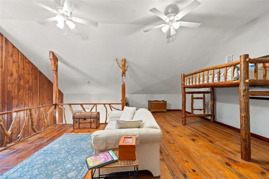 4292 Culbreath Road Brooksville, FL 34601 - Photo 21 of 41 a living room with furniture a ceiling fan and a rug