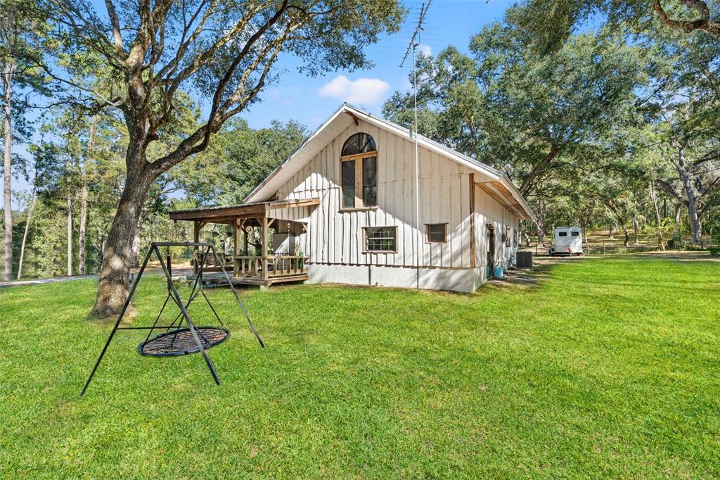 4292 Culbreath Road Brooksville, FL 34601 - Photo 23 of 41 a view of a house with a yard
