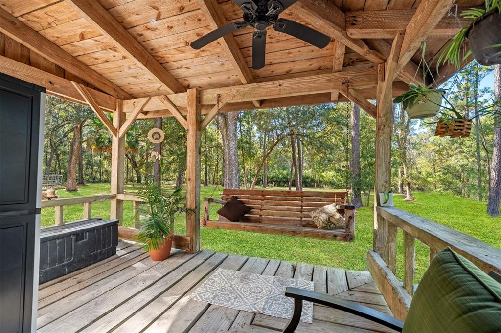 4292 Culbreath Road Brooksville, FL 34601 - Photo 3 of 41 a view of a wooden chairs in a balcony