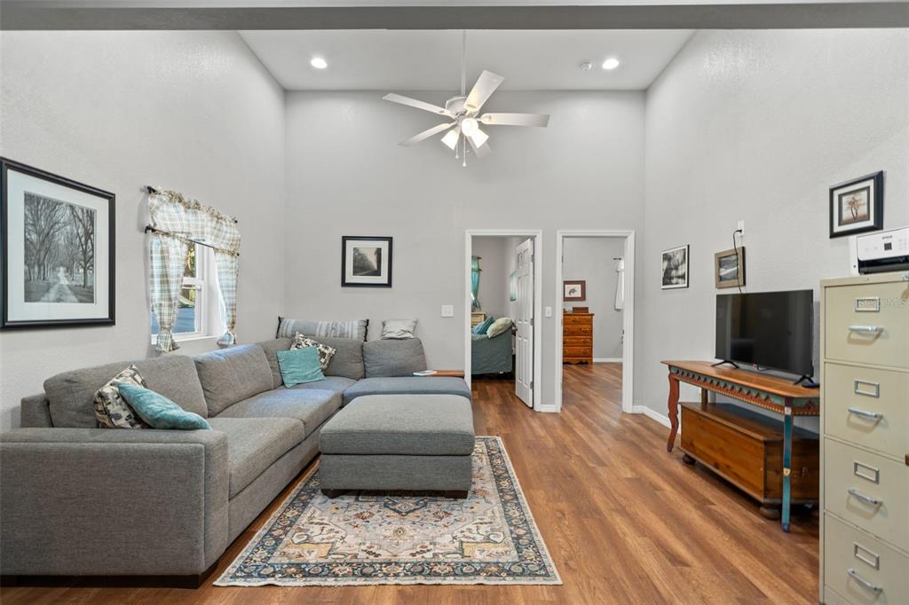 4292 Culbreath Road Brooksville, FL 34601 - Photo 5 of 41 a living room with furniture and a flat screen tv