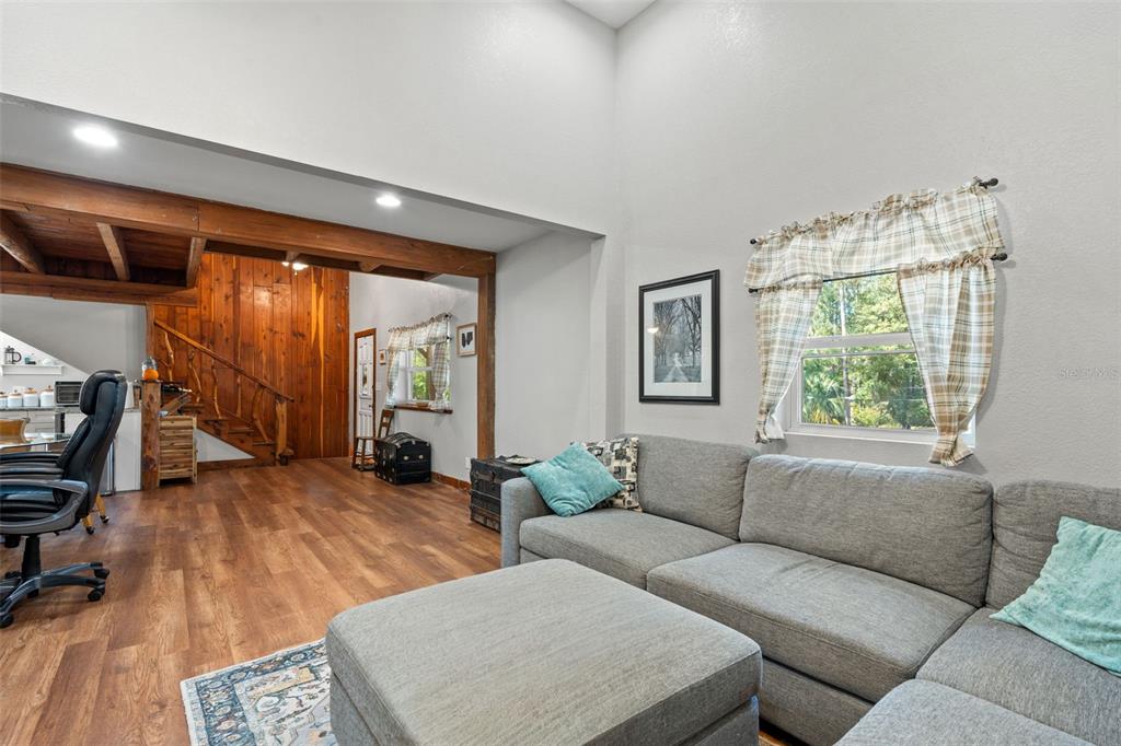4292 Culbreath Road Brooksville, FL 34601 - Photo 6 of 41 a living room with furniture and a large window