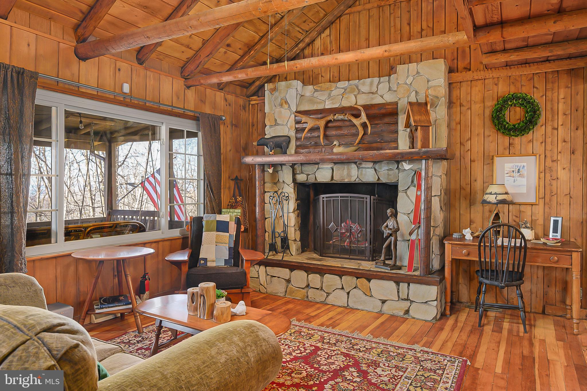 412 Revenoor Road Harpers Ferry, WV 25425 - Photo 7 of 38 Cozy Stone Fireplace off Kitchen
