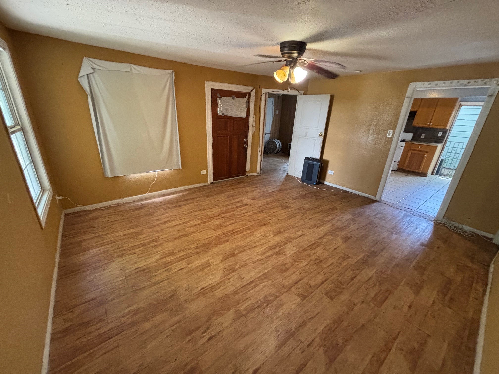 4810 Alf Avenue Austin, TX 78721 - Photo 9 of 16 a view of empty room with wooden floor
