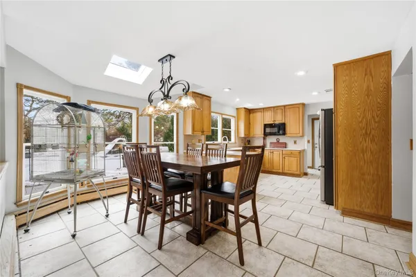 a view of a dining room kitchen and furniture