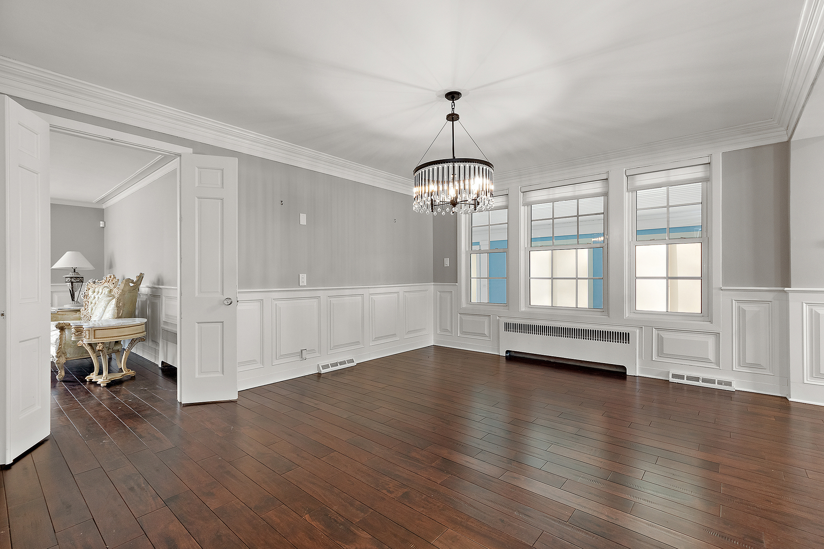 305 North Reed Street Joliet, IL 60435 - Photo 11 of 62 a view of empty room with wooden floor and fan