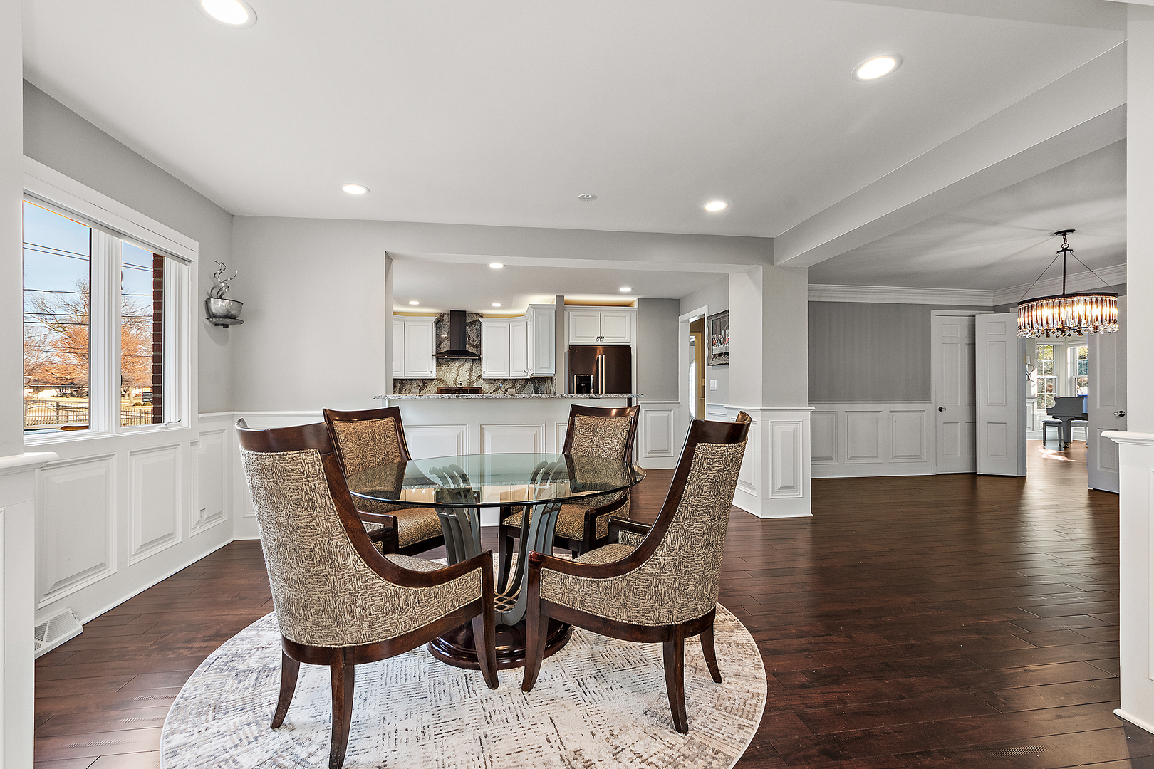 305 North Reed Street Joliet, IL 60435 - Photo 19 of 62 a view of a dining room with furniture and wooden floor