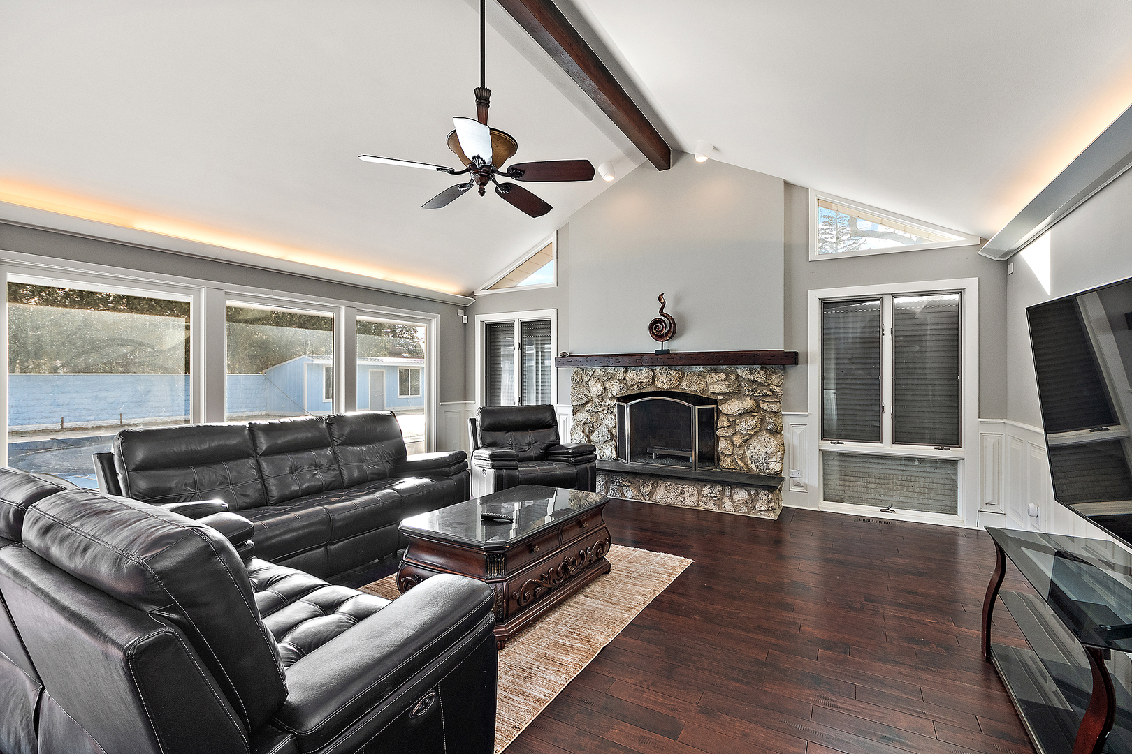 305 North Reed Street Joliet, IL 60435 - Photo 20 of 62 a living room with furniture and a fireplace