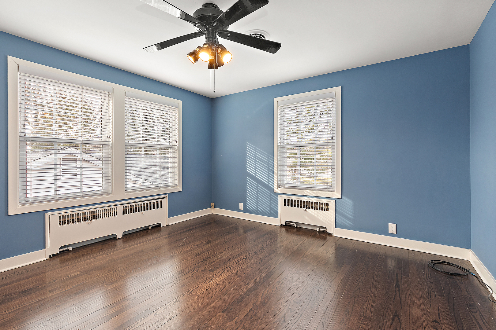 305 North Reed Street Joliet, IL 60435 - Photo 35 of 62 wooden floor in an empty room with a window