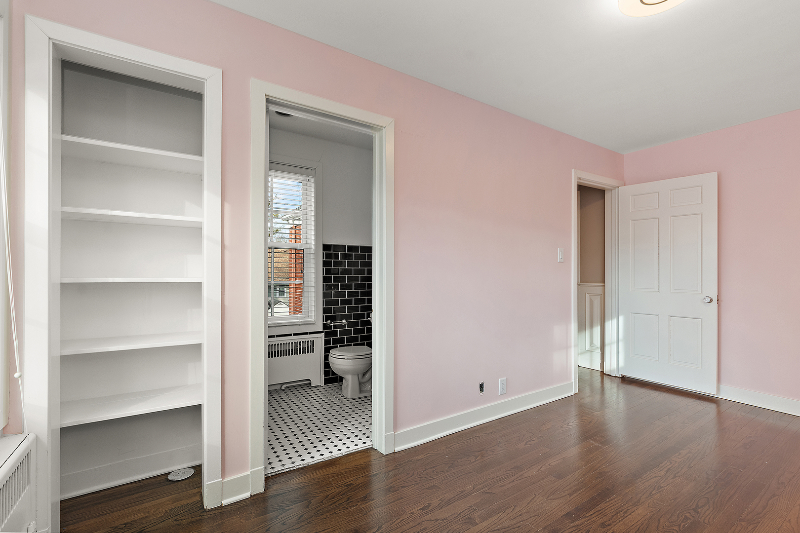 305 North Reed Street Joliet, IL 60435 - Photo 38 of 62 a view of a livingroom with wooden floor and closet