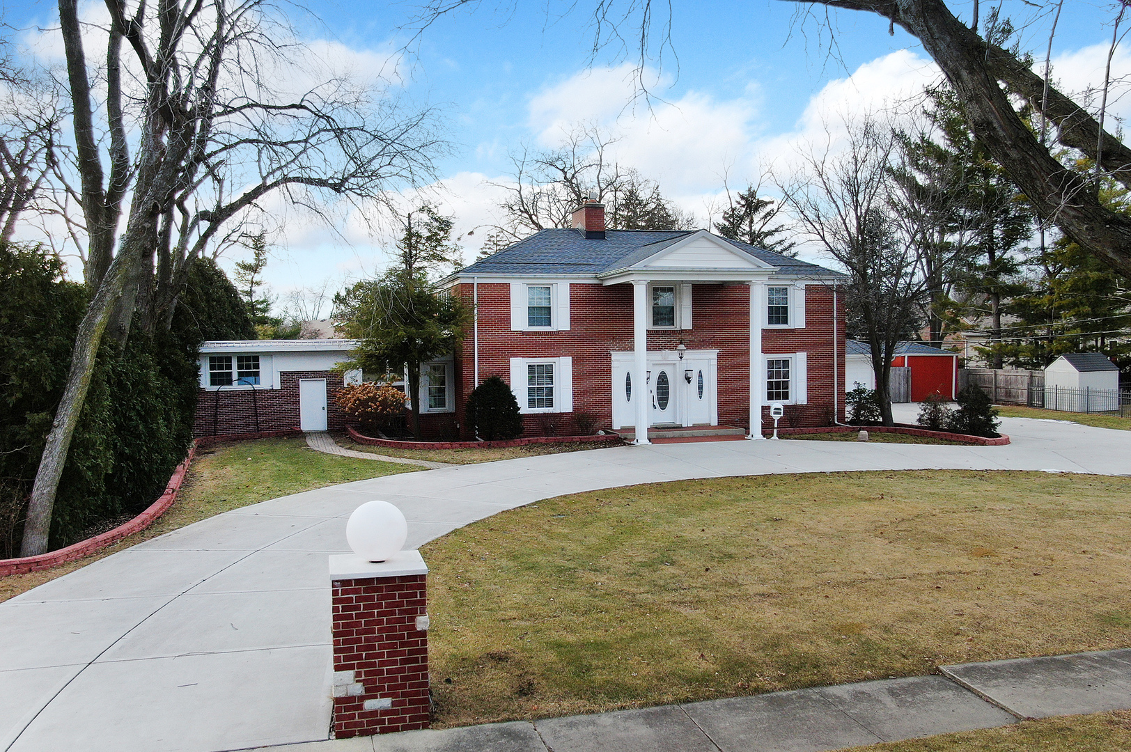 305 North Reed Street Joliet, IL 60435 - Photo 4 of 62 a view of a house with swimming pool and sitting area
