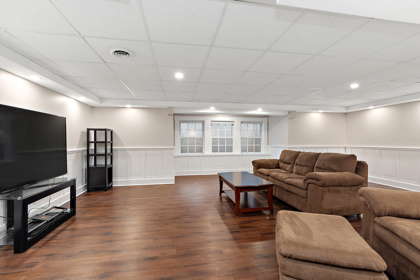 305 North Reed Street Joliet, IL 60435 - Photo 41 of 62 a living room with furniture and a flat screen tv