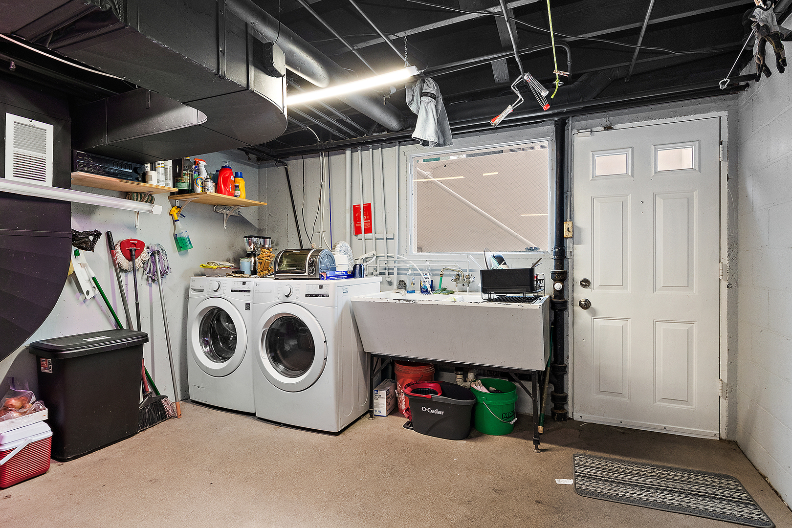305 North Reed Street Joliet, IL 60435 - Photo 45 of 62 a utility room with dryer and washer