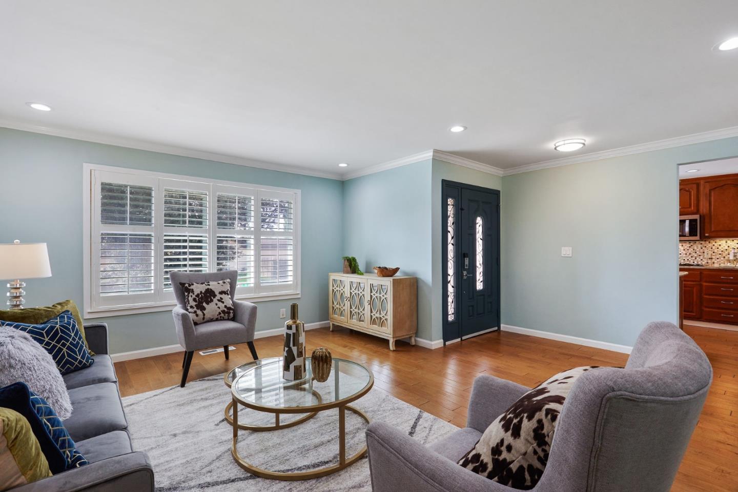 492 Dolores Drive Milpitas, CA 95035 - Photo 11 of 50 a living room with furniture and a potted plant