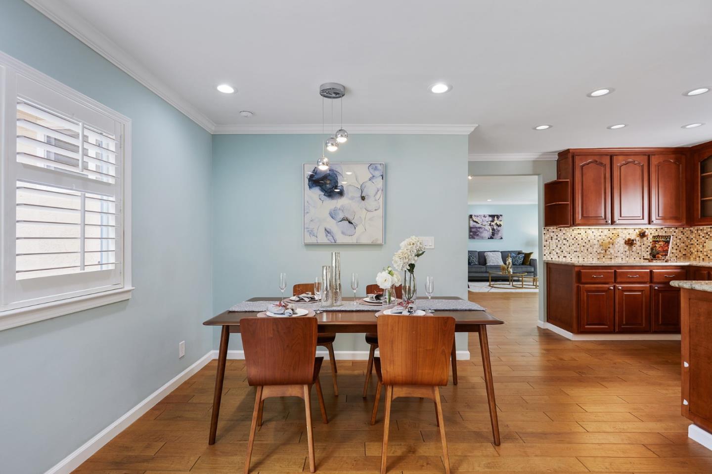 492 Dolores Drive Milpitas, CA 95035 - Photo 13 of 50 a view of a dining room with furniture and wooden floor