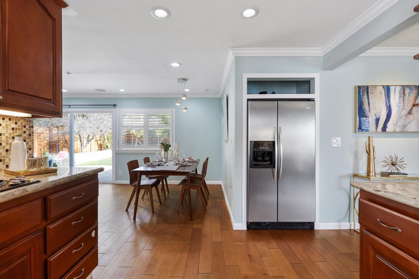 492 Dolores Drive Milpitas, CA 95035 - Photo 18 of 50 a kitchen with a table and chairs