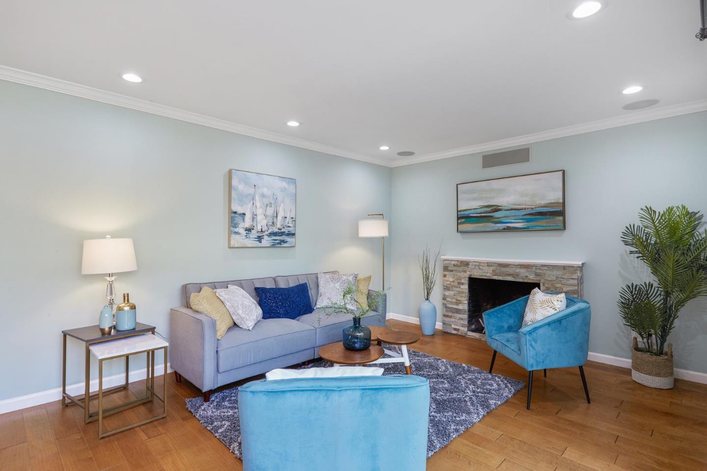 492 Dolores Drive Milpitas, CA 95035 - Photo 24 of 50 a living room with furniture and a fireplace
