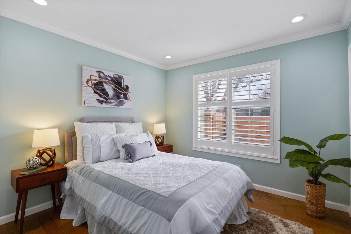 492 Dolores Drive Milpitas, CA 95035 - Photo 37 of 50 a bedroom with a bed and a painting on the wall