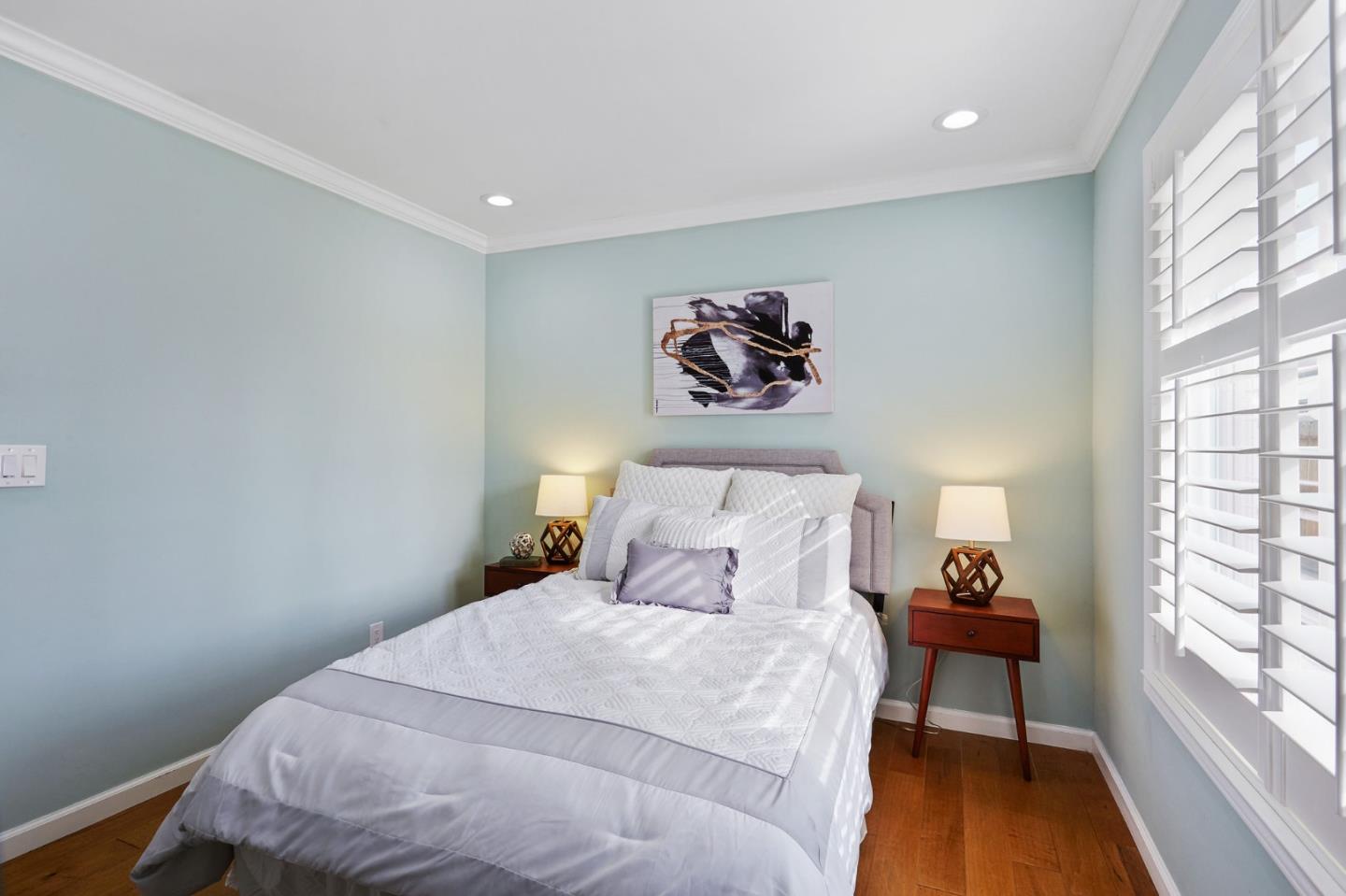 492 Dolores Drive Milpitas, CA 95035 - Photo 38 of 50 a bedroom with a bed and a painting on the wall