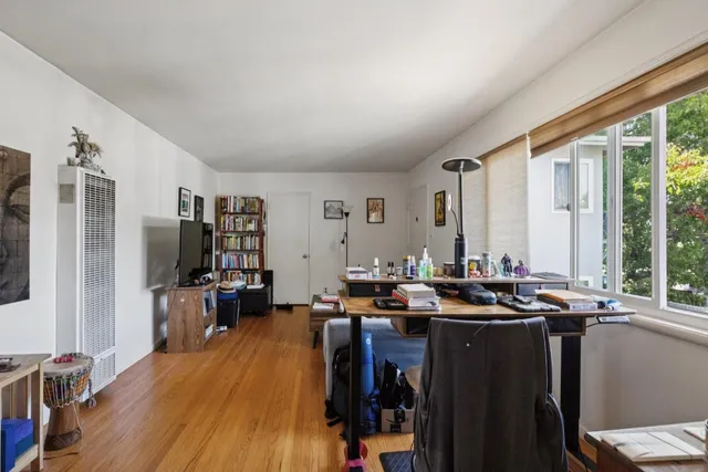 a view of a workspace with furniture and toys