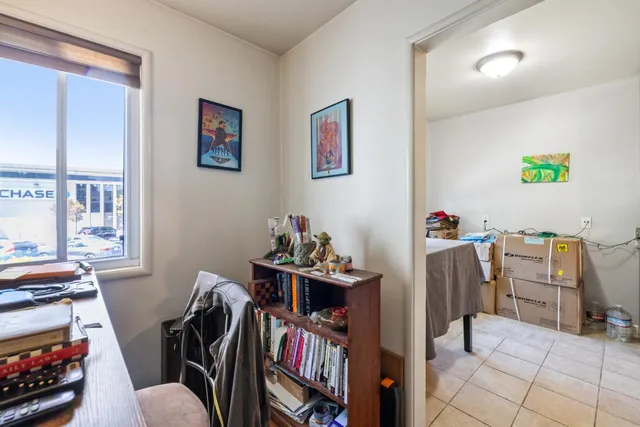 a view of kitchen and dining room with furniture