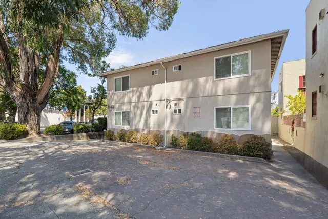a view of a house with a street