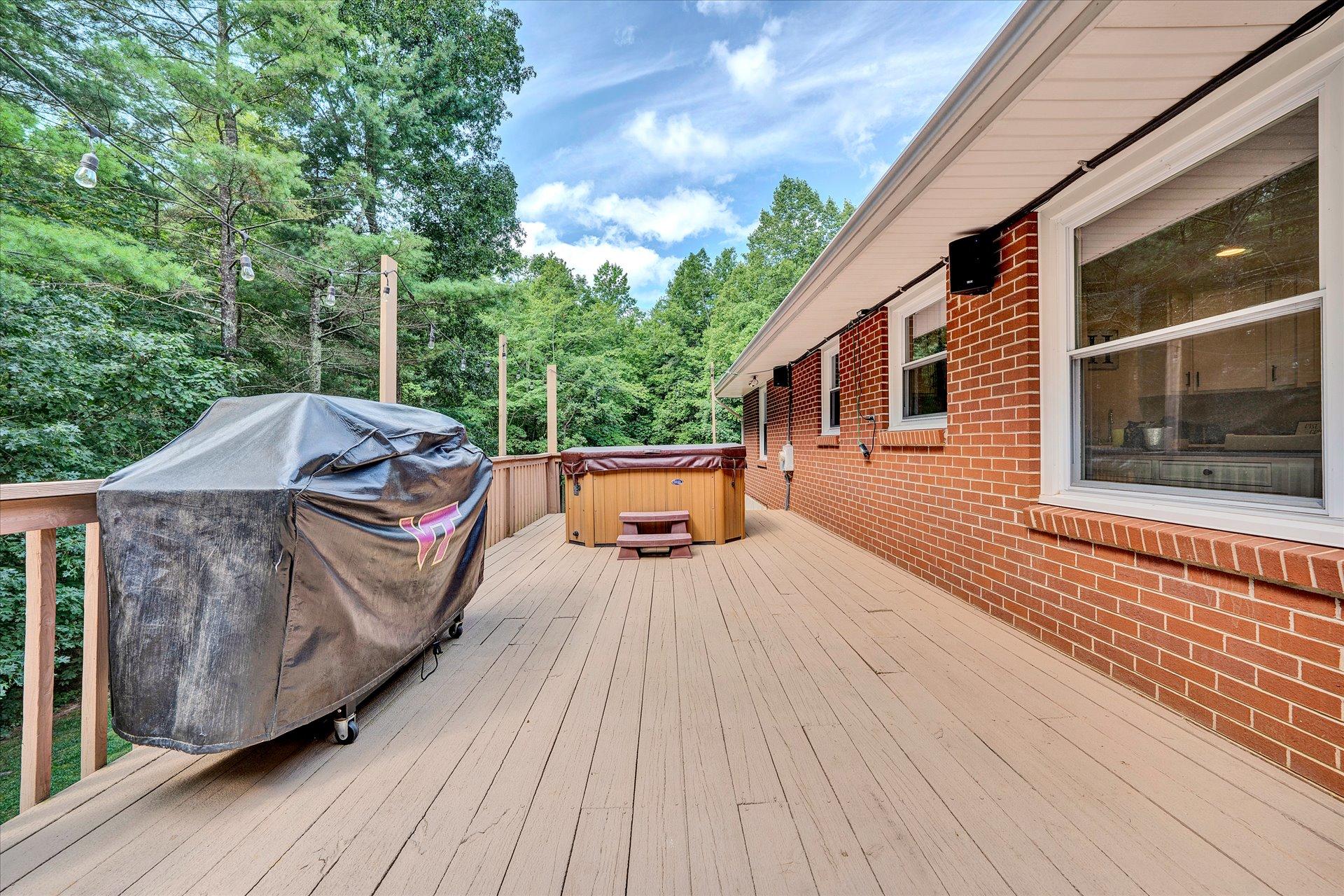 210 Sunset Ridge Road Callaway, VA 24067 - Photo 14 of 39 a view of a roof deck with wooden floor and fence