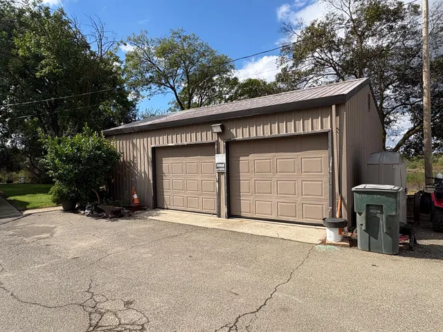 a front view of a house with a garage