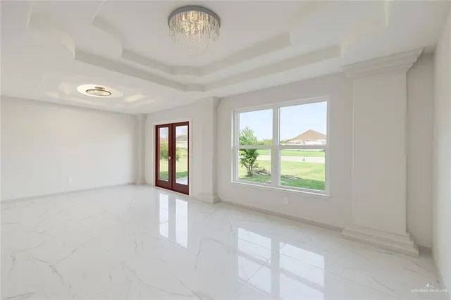 an empty room with windows