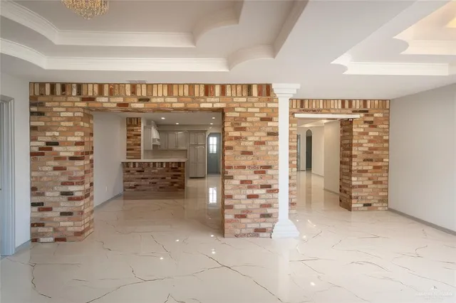 a view of empty room with windows