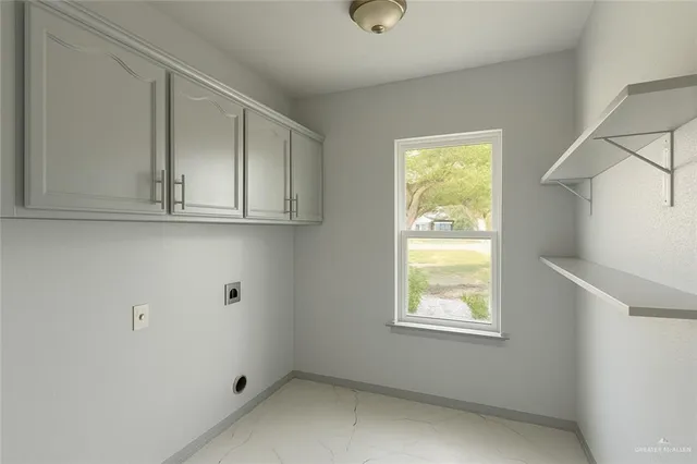 a view of empty room with a washer and dryer