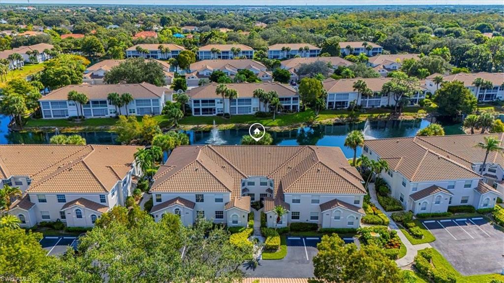 6804 Satinleaf Road South, Unit 102 Naples, FL 34109 - Photo 22 of 35 an aerial view of a