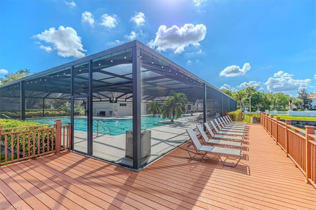 6804 Satinleaf Road South, Unit 102 Naples, FL 34109 - Photo 27 of 35 a view of a chairs and tables in the balcony