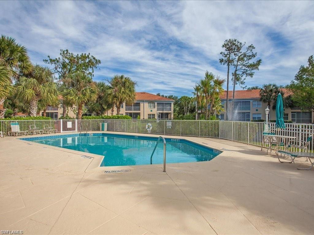 6804 Satinleaf Road South, Unit 102 Naples, FL 34109 - Photo 30 of 35 a view of a basket ball ground