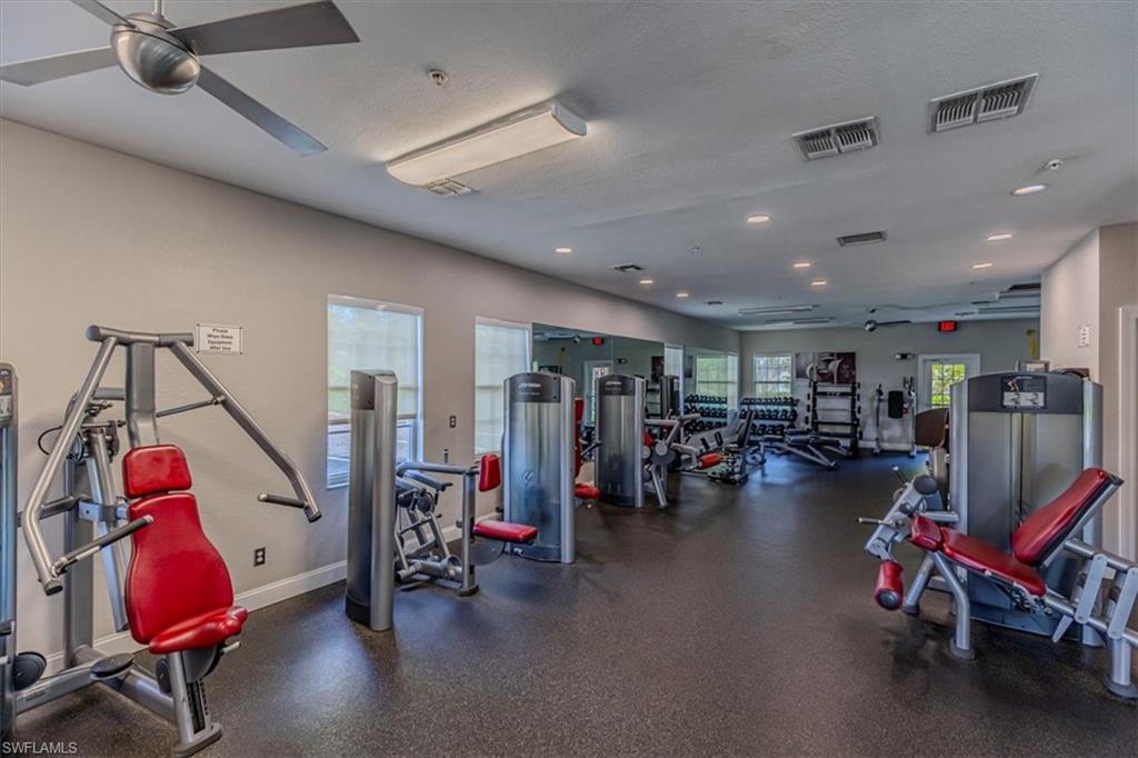 6804 Satinleaf Road South, Unit 102 Naples, FL 34109 - Photo 31 of 35 a view of a room with gym equipment