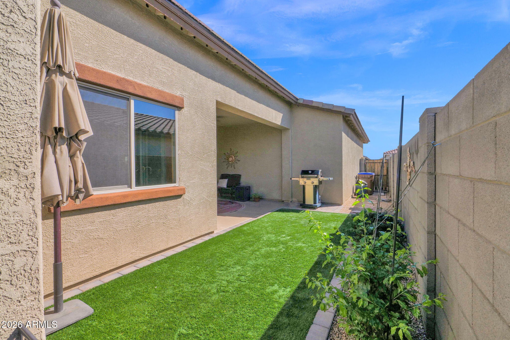 1792 South Hayley Road Apache Junction, AZ 85119 - Photo 43 of 64 a front view of a house with a yard