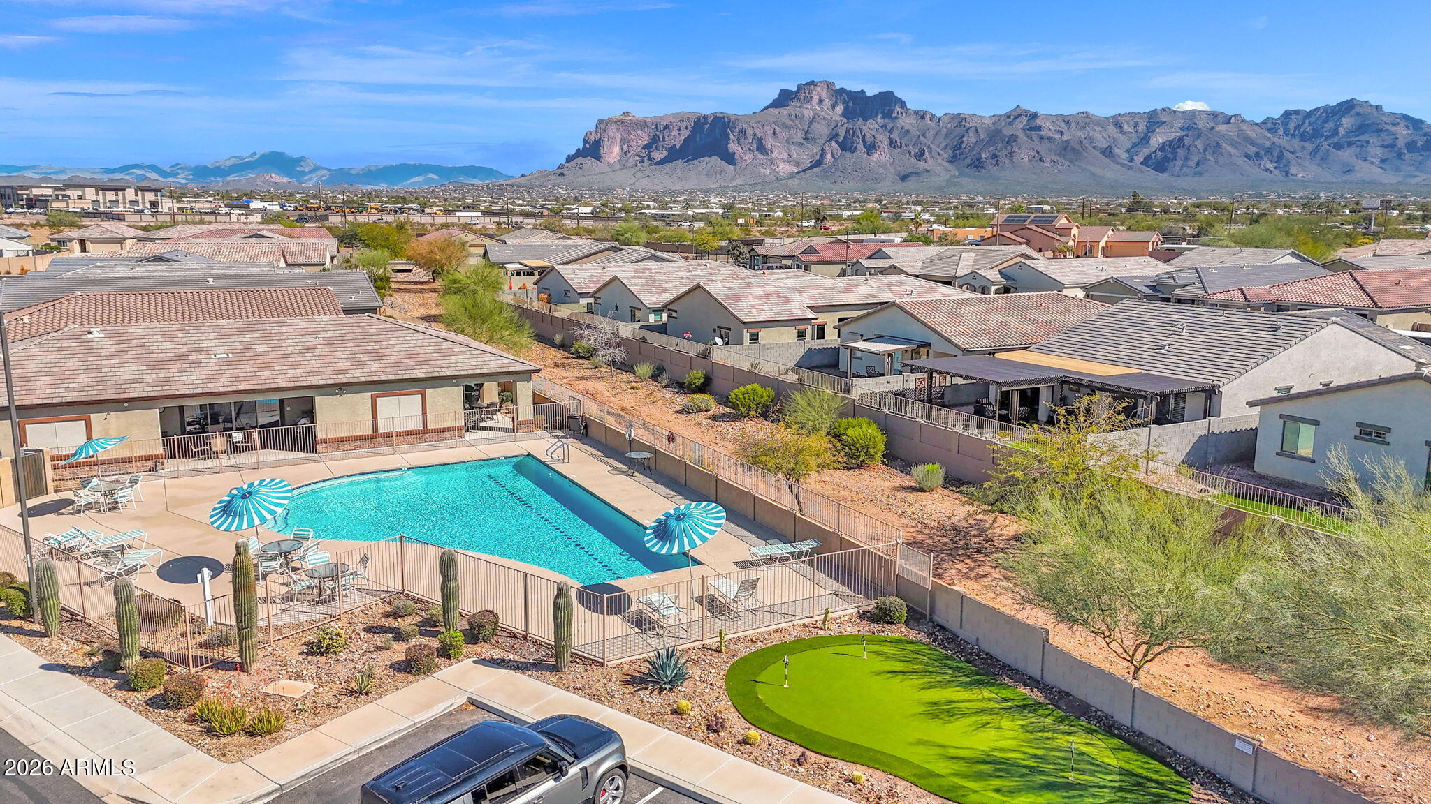1792 South Hayley Road Apache Junction, AZ 85119 - Photo 6 of 64 an aerial view of residential houses with outdoor space and river