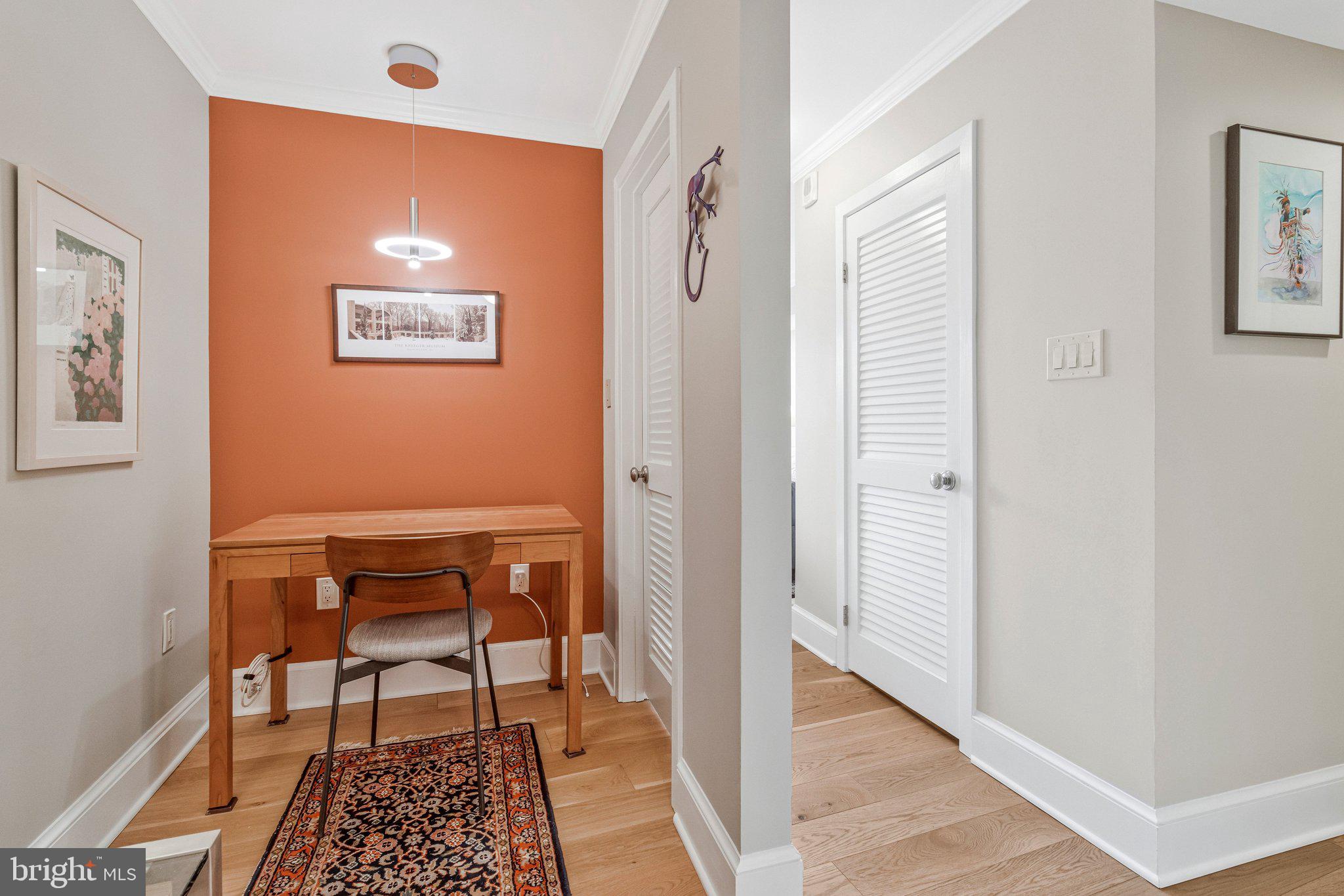 1101 South Arlington Ridge Road, Unit 706 Arlington, VA 22202 - Photo 27 of 59 a view of a hallway with front door
