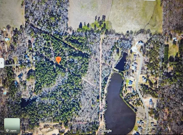 an aerial view of residential house with outdoor space