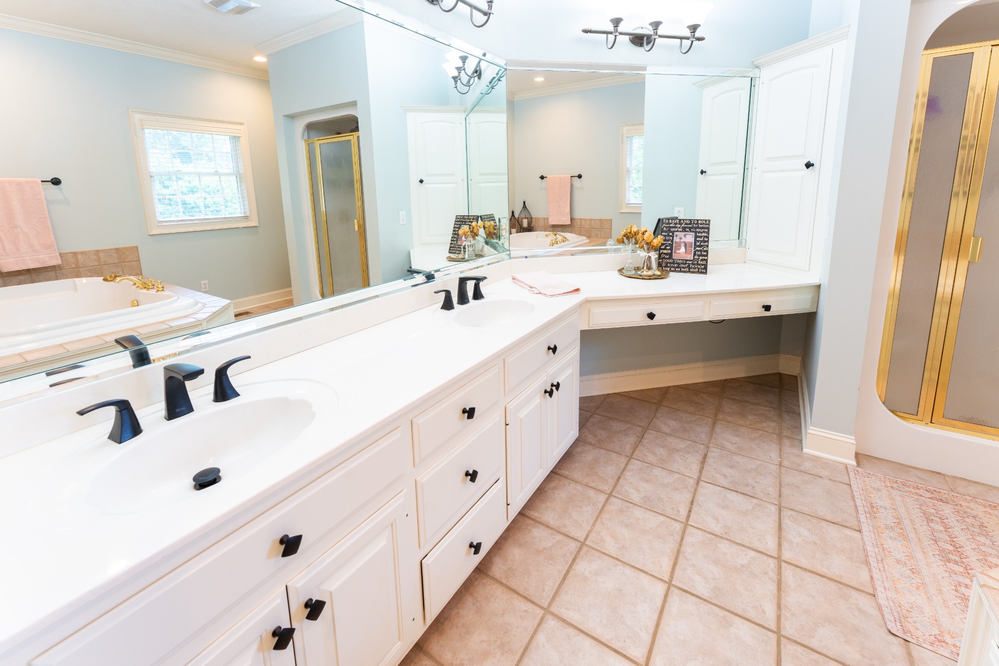 1015 Kelly Road Dyersburg, TN 38024 - Photo 26 of 41 a bathroom with a double vanity sink mirror and