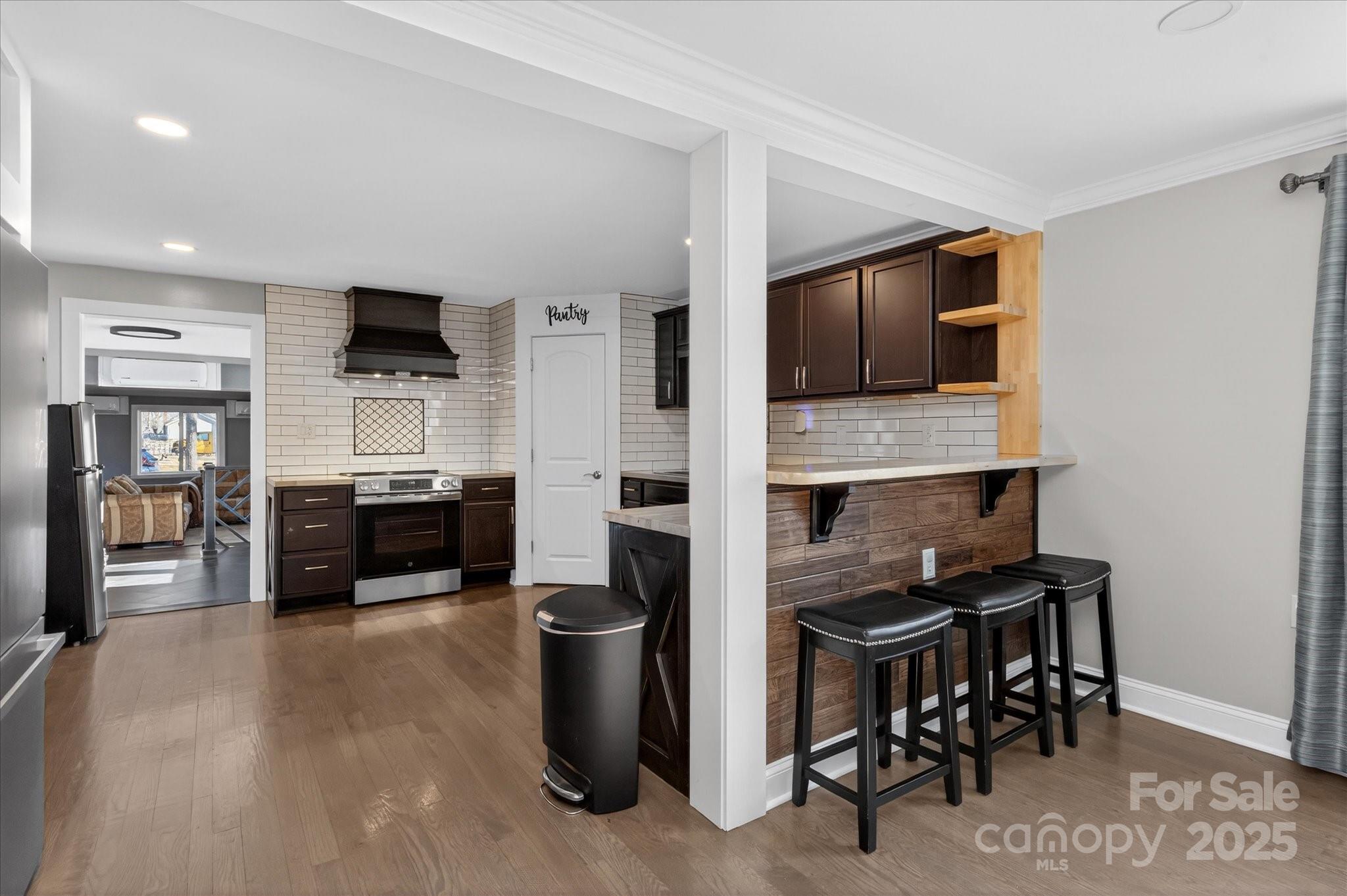 1117 Jug Broome Road Monroe, NC 28112 - Photo 11 of 38 a kitchen with stainless steel appliances a refrigerator and microwave