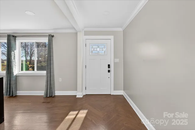 an empty room with windows