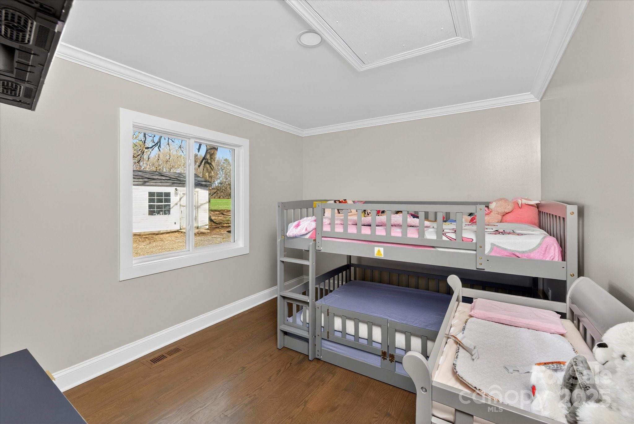 1117 Jug Broome Road Monroe, NC 28112 - Photo 24 of 38 a bedroom with a bed and a window