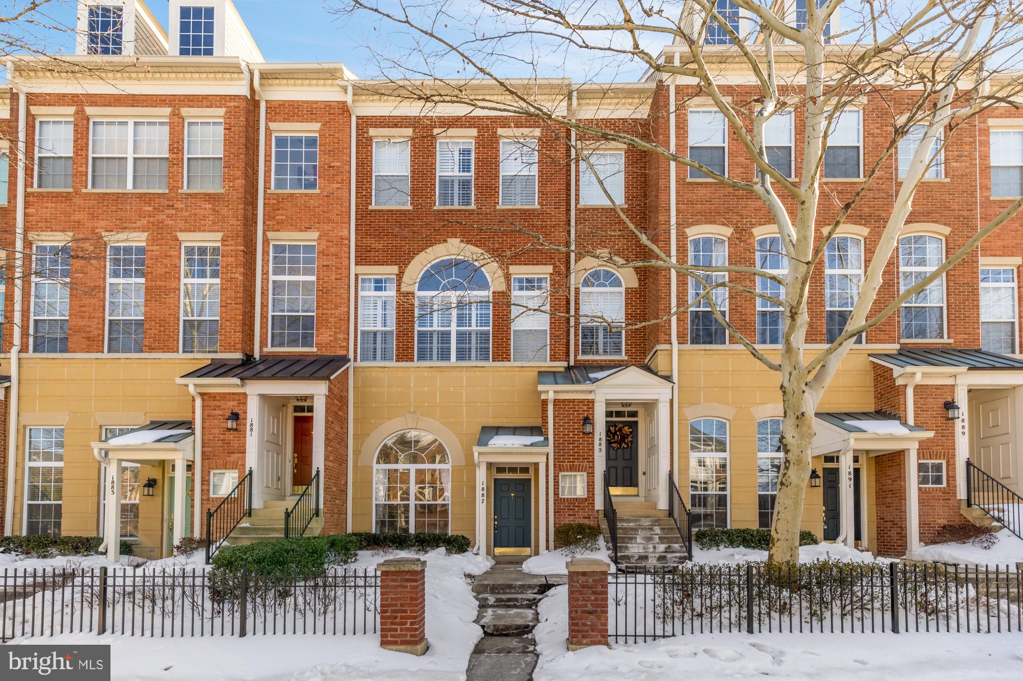 1887 Crescent Park Drive, Unit 111A Reston, VA 20190 - Photo 1 of 27 front view of a brick building