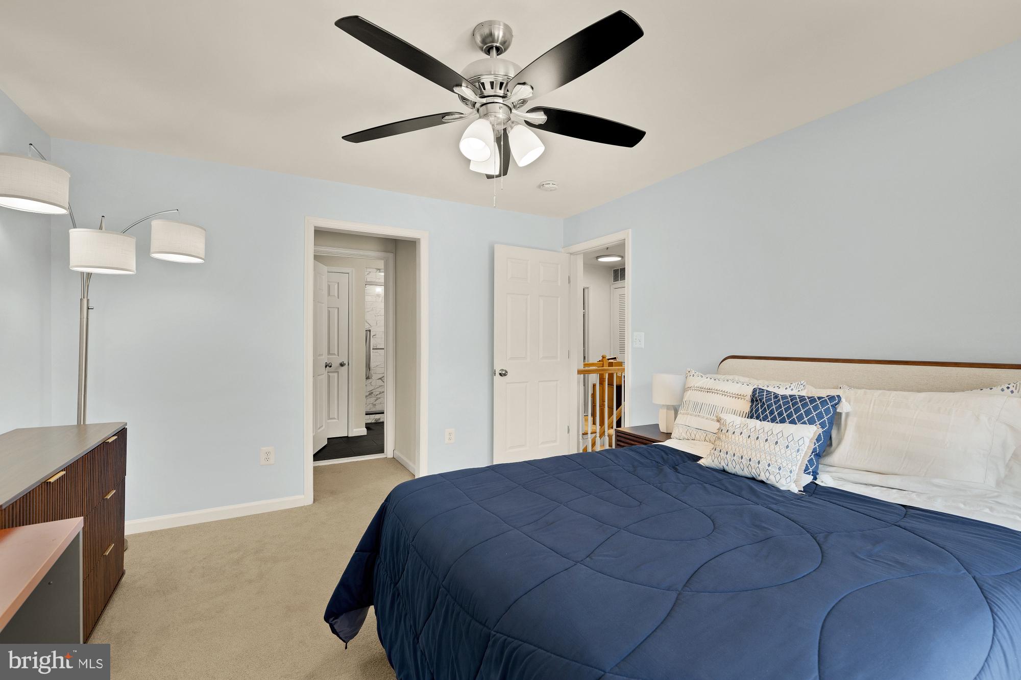 1887 Crescent Park Drive, Unit 111A Reston, VA 20190 - Photo 20 of 27 a bedroom with a bed and window