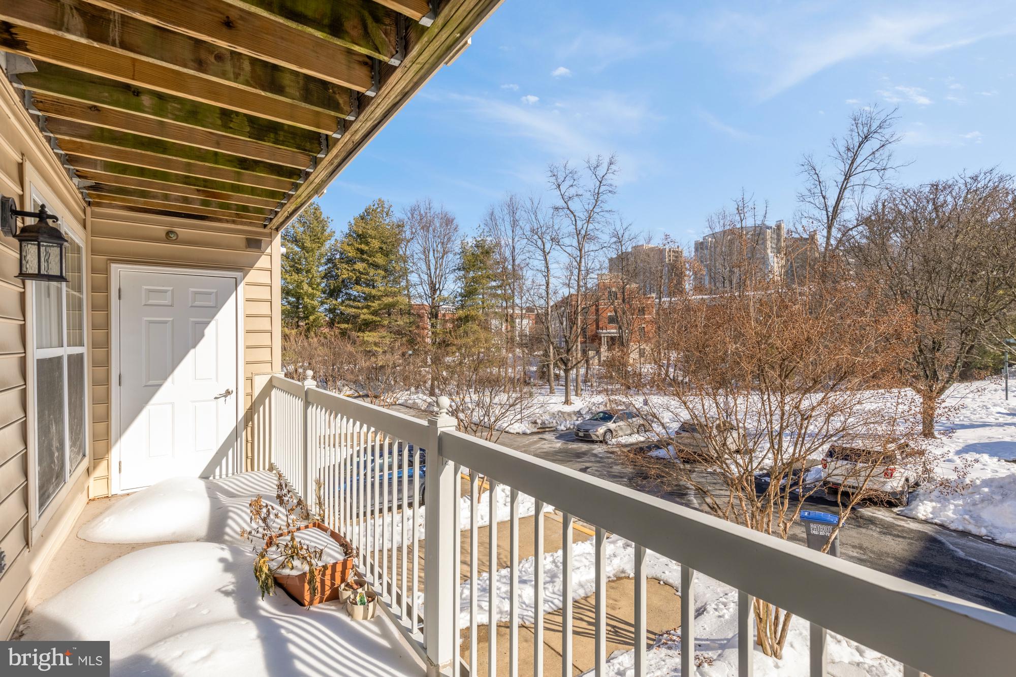 1887 Crescent Park Drive, Unit 111A Reston, VA 20190 - Photo 24 of 27 a view of a city from a balcony