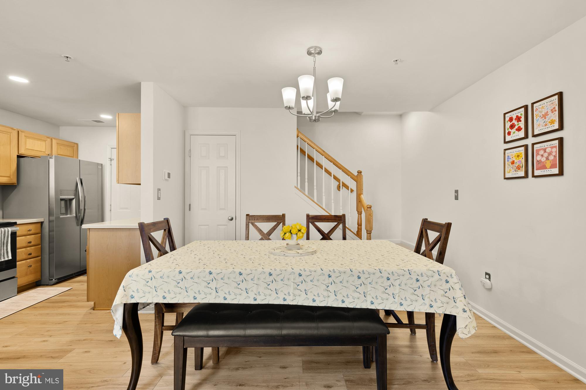 1887 Crescent Park Drive, Unit 111A Reston, VA 20190 - Photo 7 of 27 a view of a dining room with furniture