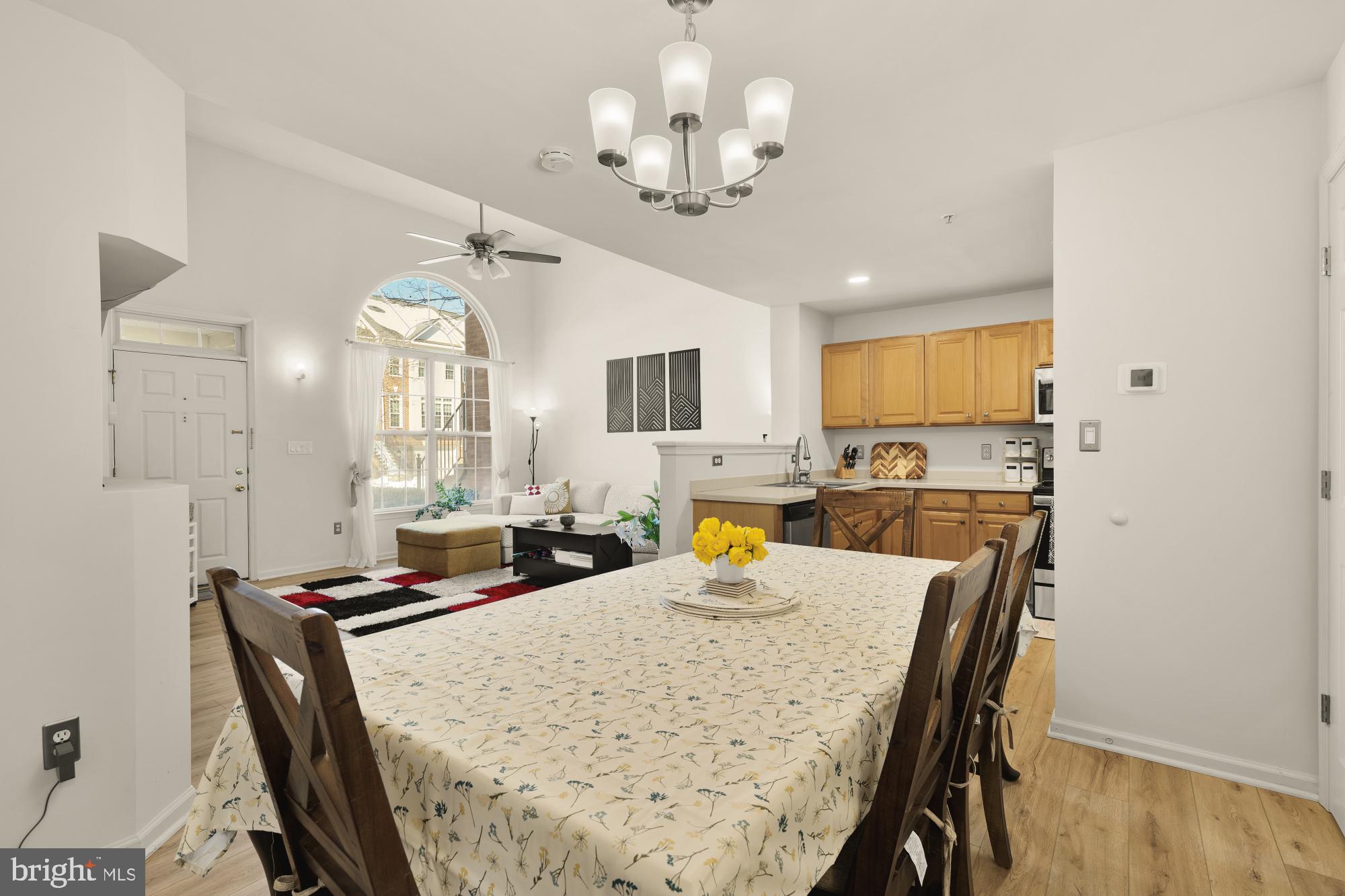 1887 Crescent Park Drive, Unit 111A Reston, VA 20190 - Photo 8 of 27 a view of a dining room with furniture